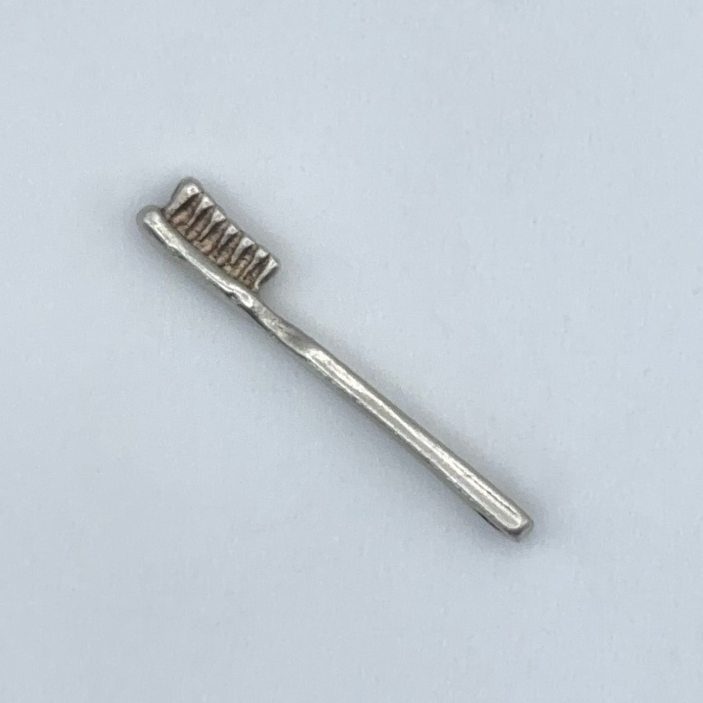 Tiny Toothbrush