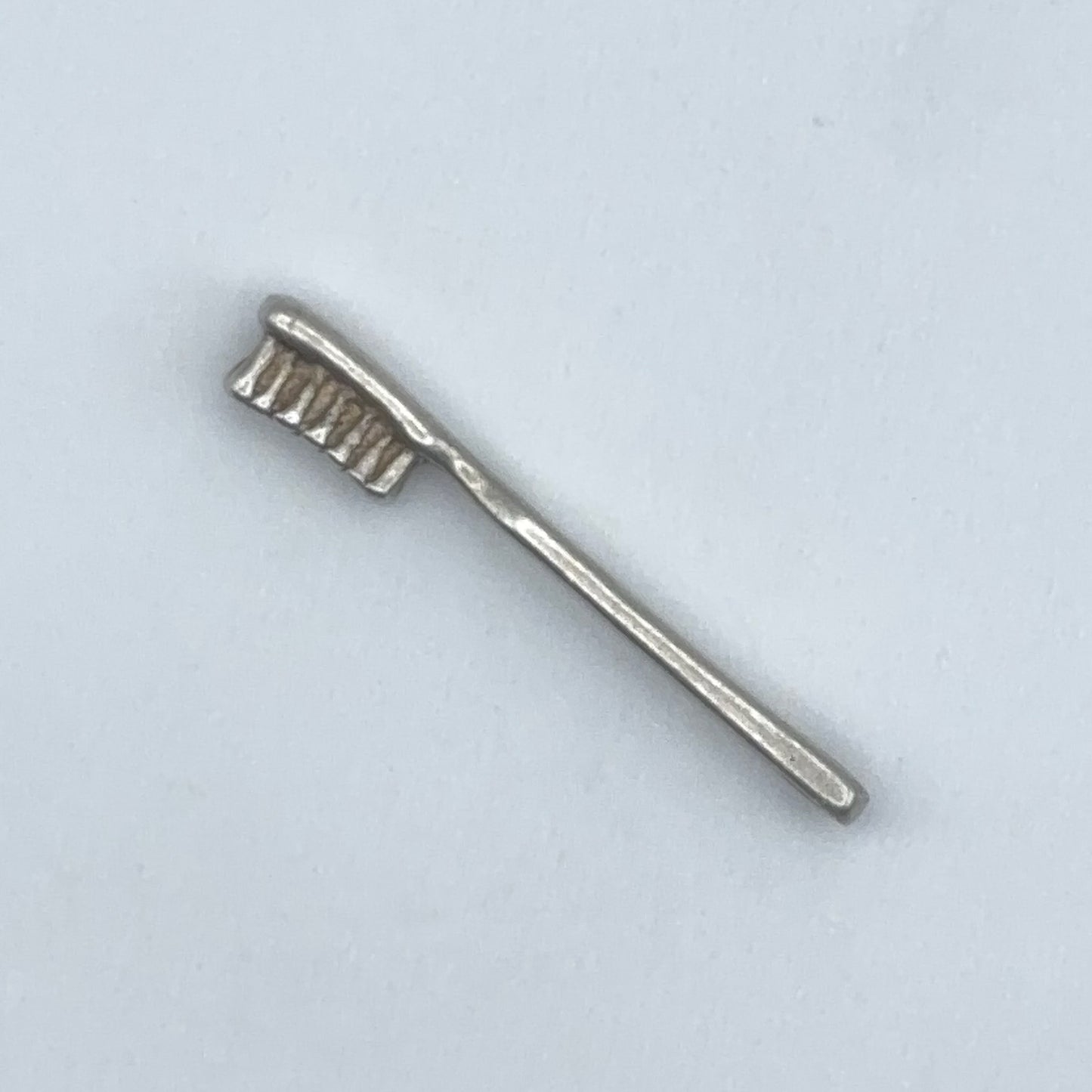 Tiny Toothbrush